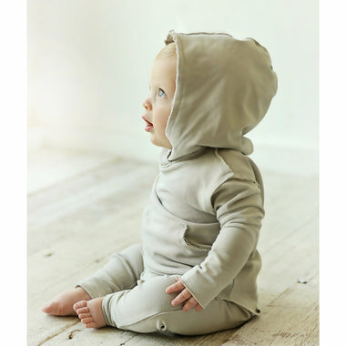 cute baby boy wearing organic hoodie  and pants beige grey