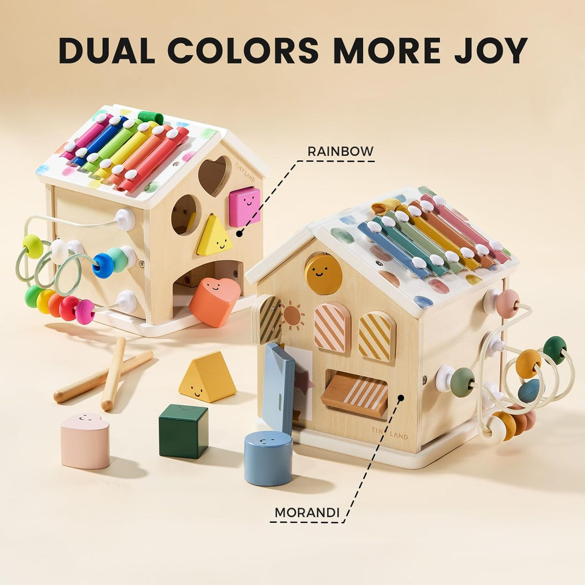 Colorful Tiny Land® Cottage Activity Cube with rainbow accents, featuring interactive panels for children’s play and learning.