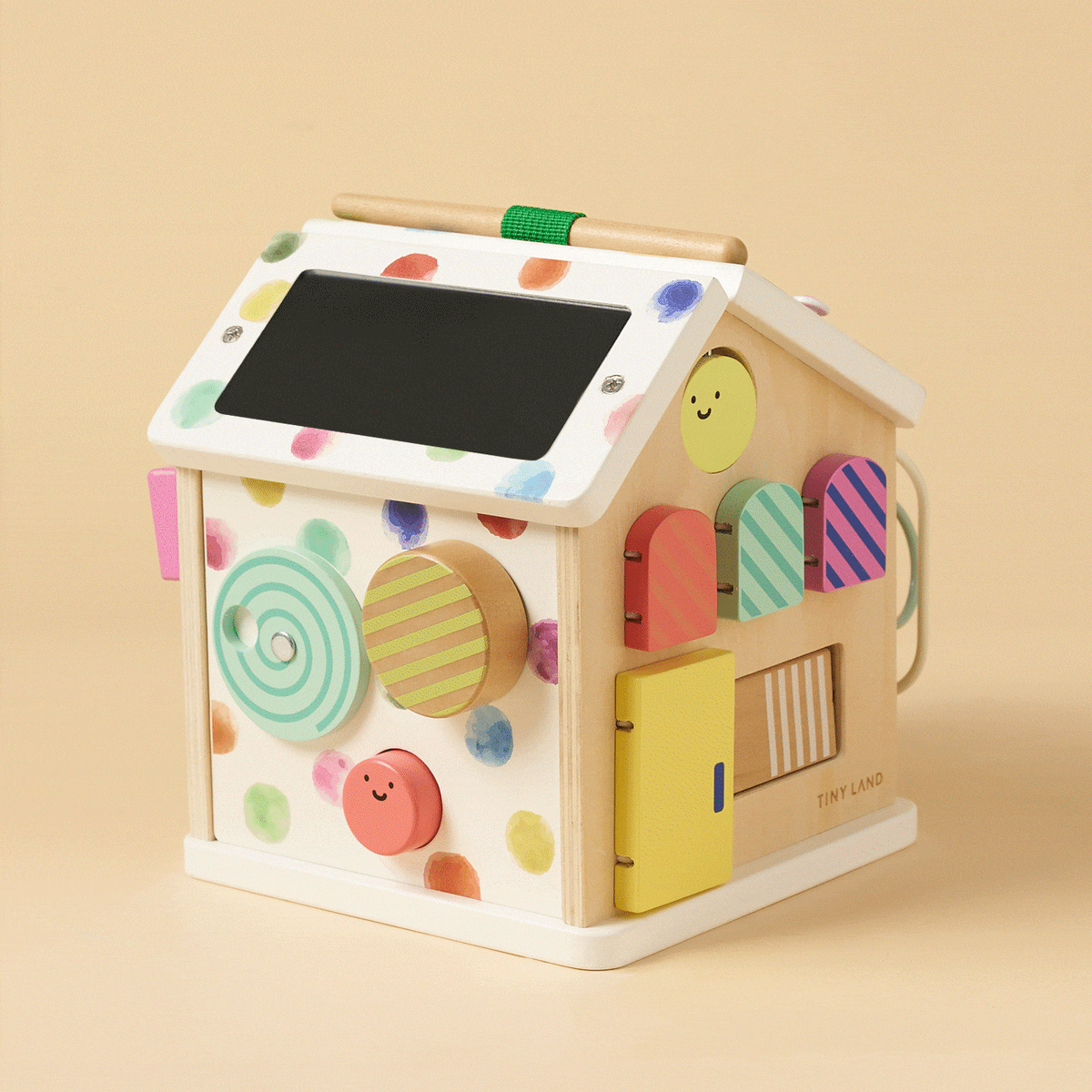 Tiny Land® Cottage Activity Cube with colorful rainbow design, featuring various interactive elements for children’s play and learning.