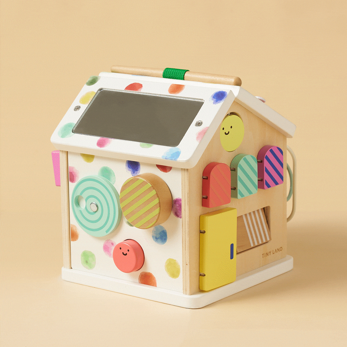 Colorful Tiny Land® Cottage Activity Cube with rainbow design, featuring interactive toys and educational elements for young children.