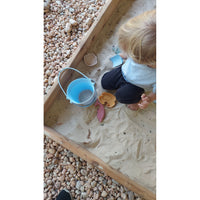 Colorful silicone sand bucket toy with matching shovel and toys for kids' outdoor play, by ShopMyLittleSongbird.