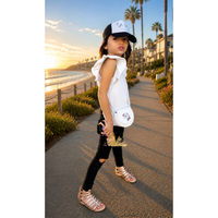 Be Mi Los Angeles Natalia Ruffle Top Sleeveless in soft fabric with ruffle details, shown on a neutral background.