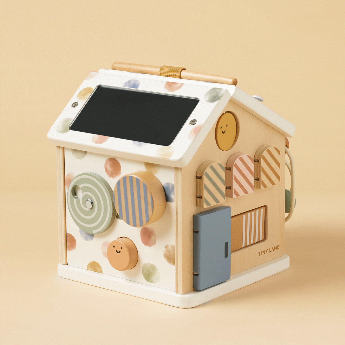 Colorful Tiny Land® Cottage Activity Cube by Tiny Land INC featuring interactive elements for children’s play and learning.