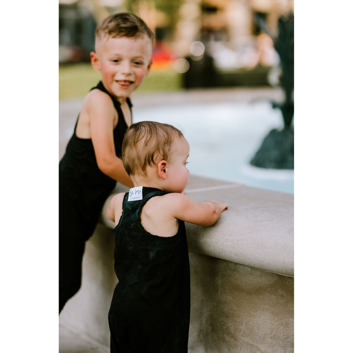Black romper by Be Mi Los Angeles featuring a stylish, comfortable design perfect for casual or summer wear.