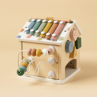 Tiny Land® Cottage Activity Cube in Morandi colors with various sensory and educational features for children.
