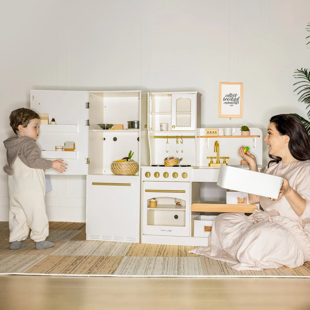 Tiny Land INC wooden play kitchen fridge with detailed cabinet design, perfect for kids' pretend cooking and role-playing activities.