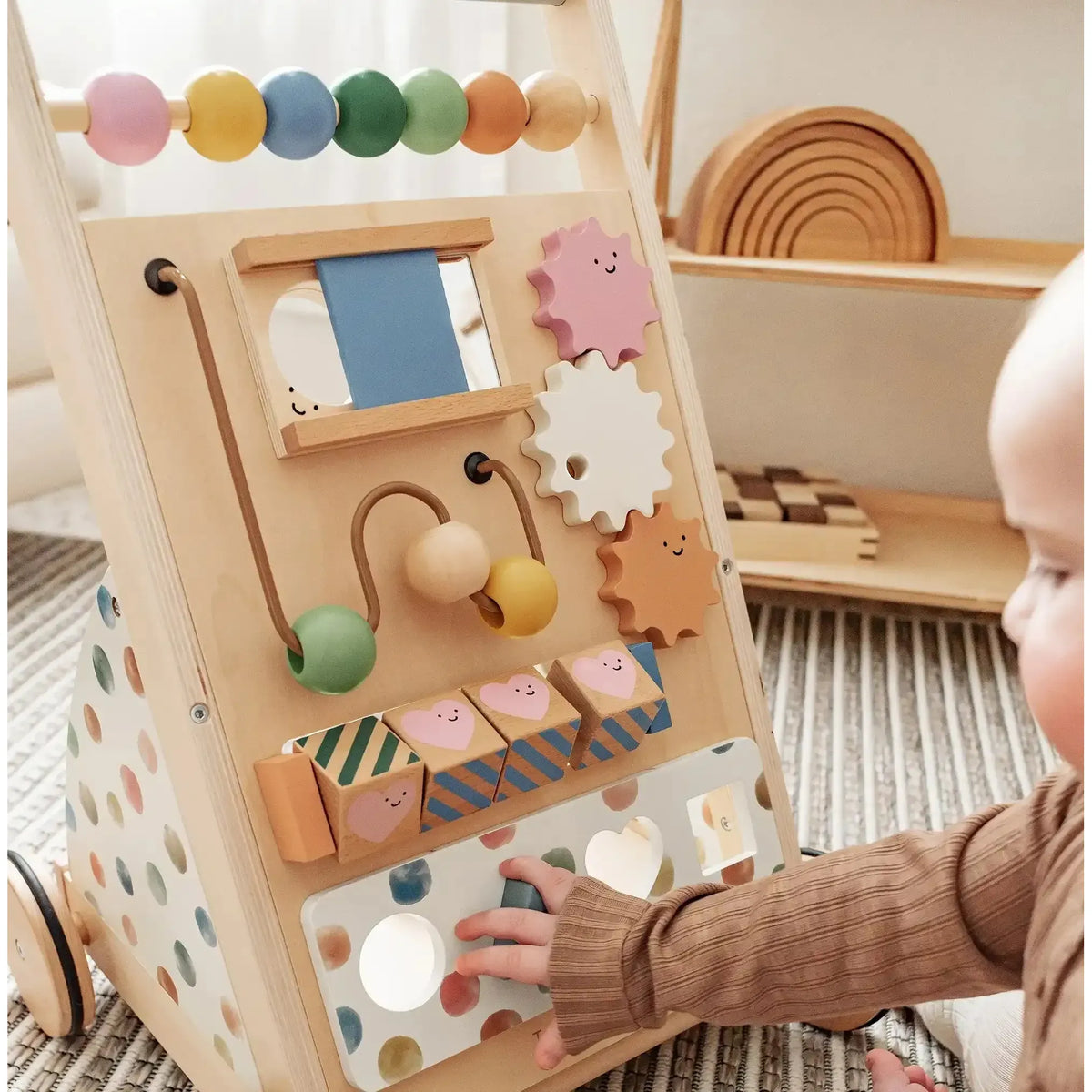 Natural wooden baby walker by Tiny Land INC, versatile toddler walker with sturdy wooden frame and smooth finish.