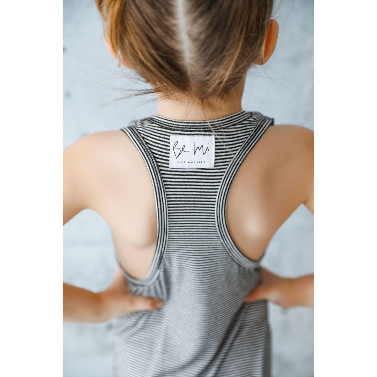 Be Mi Los Angeles romper with fine stripes, lightweight sleeveless design, and casual fit perfect for warm weather.