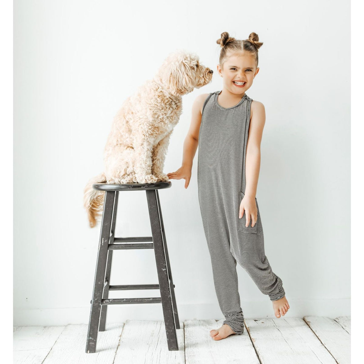 Be Mi Los Angeles romper with fine stripe pattern, lightweight fabric, and sleeveless design for casual summer wear.