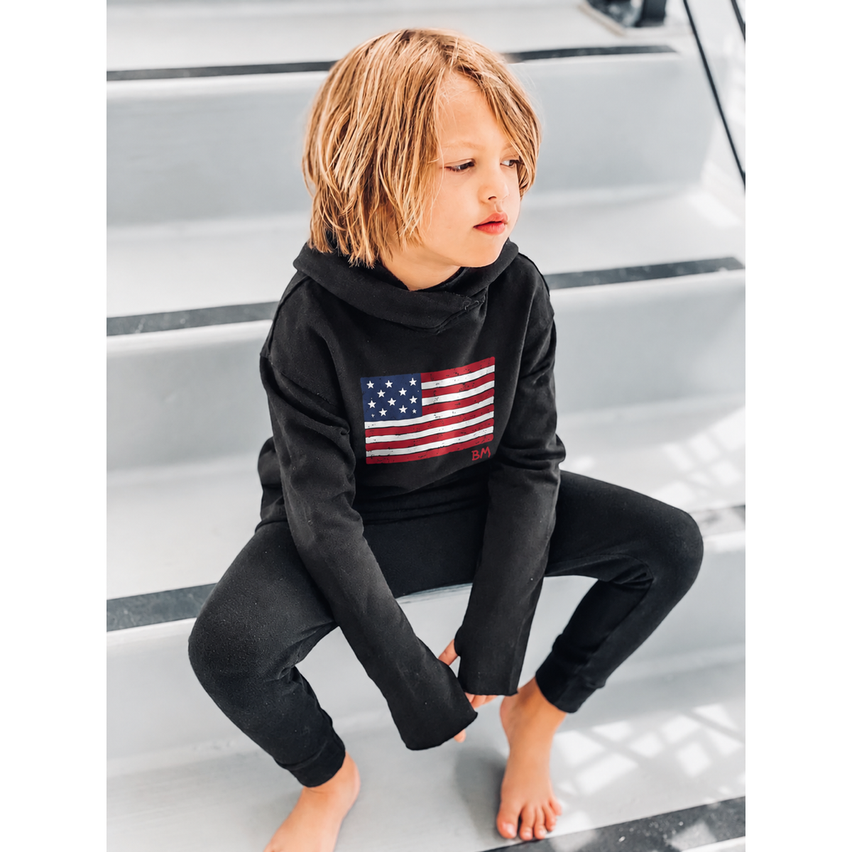Black Organic Benji Flag Hoodie sweatshirt by Be Mi Los Angeles featuring a stylish Benji flag design on the front.