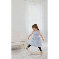 Children's balance board rocker toy from ShopMyLittleSongbird, featuring a colorful, curved wooden design for balance and fun.