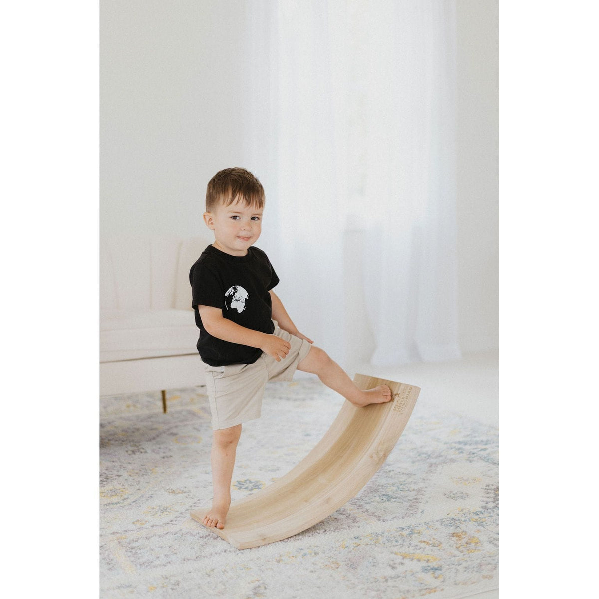 Balance board rocker toy from ShopMyLittleSongbird, featuring a colorful, sturdy design for active play and balance development.