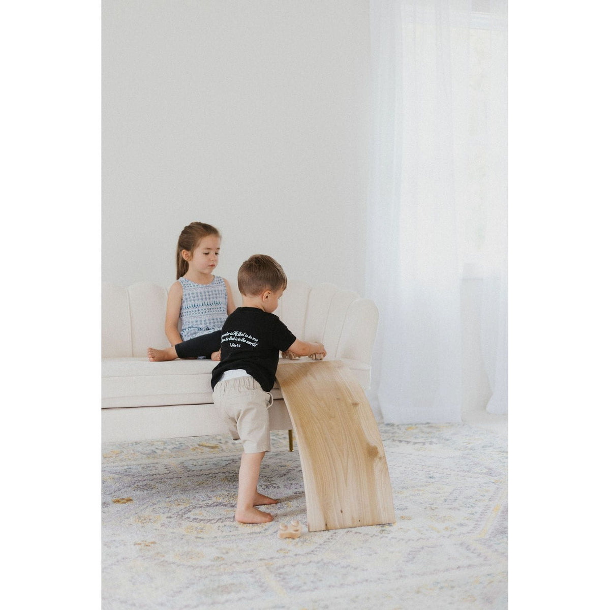 Children's balance board rocker toy from ShopMyLittleSongbird, featuring a sturdy wooden design for active play and balance development.