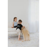 Children's balance board rocker toy from ShopMyLittleSongbird, featuring a sturdy wooden design for active play and balance development.