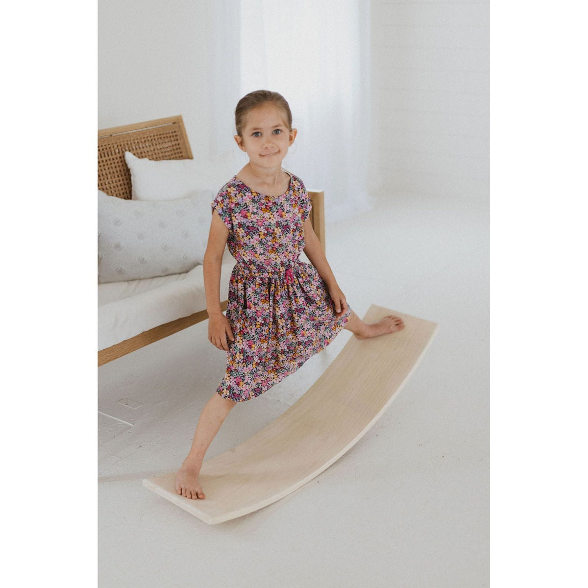 Balance board toy by ShopMyLittleSongbird, featuring a colorful rocker for kids to improve balance and coordination.