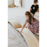 Balance board toy by ShopMyLittleSongbird, featuring a colorful rocker for kids to develop balance and coordination.