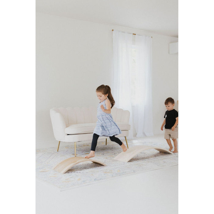 Children's balance board rocker toy by ShopMyLittleSongbird, featuring a colorful, sturdy wooden design for active play and coordination.
