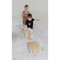 Children's balance board rocker toy by ShopMyLittleSongbird, featuring a wooden, curved design for balance and coordination play.