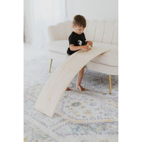 ShopMyLittleSongbird balance board toy with a wooden rocker surface for balance and coordination play.