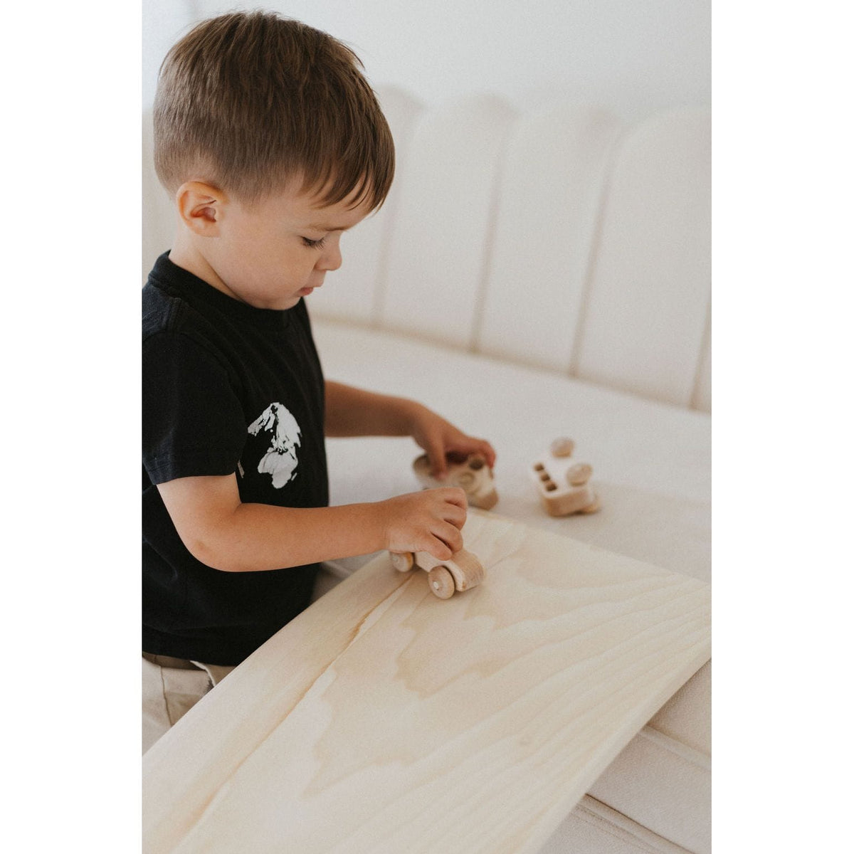 Colorful ShopMyLittleSongbird balance board toy with rounded edges and textured surface for safe, active play.