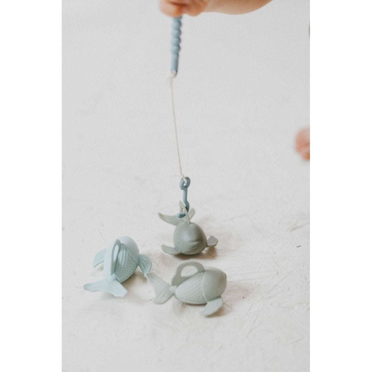 Colorful silicone fishing set featuring various playful silicone toys, designed for children’s imaginative play and sensory development.