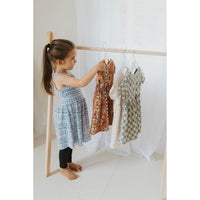 Wooden toddler clothes rack from ShopMyLittleSongbird, showcasing a sturdy wooden toy for organizing children's clothing.