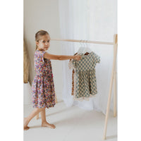 Wooden toddler clothes rack from ShopMyLittleSongbird, featuring a sturdy design with hanging space for children's clothes.