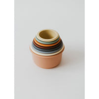Colorful silicone stacking toy with multiple cups, designed for children to develop fine motor skills and coordination.