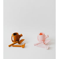 Colorful silicone watering can set for children, soft and flexible silicone toys perfect for imaginative play and watering activities.