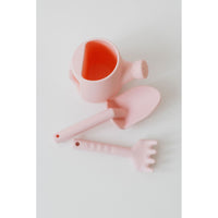 Colorful silicone watering can set for children, soft, flexible toys designed for play and watering activities.