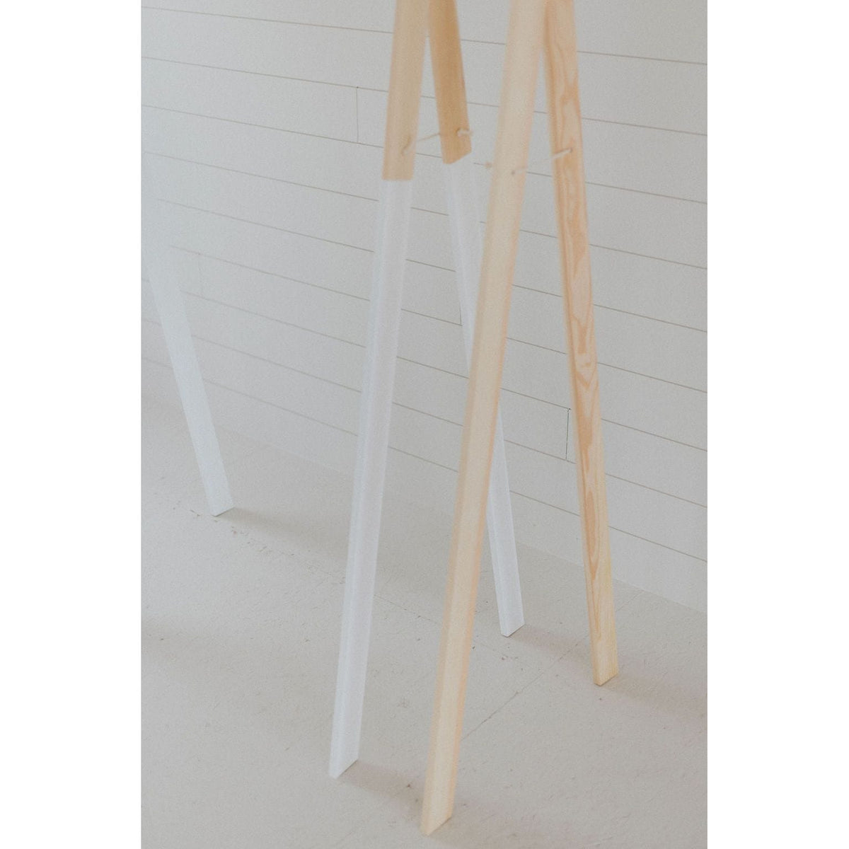 Wooden toddler clothes rack from ShopMyLittleSongbird, featuring a sturdy wooden frame with hanging space for children's clothing.