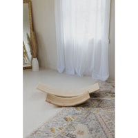 Wooden balance board rocker toy from ShopMyLittleSongbird, designed for kids to improve balance and coordination.