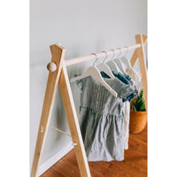 Wooden toddler clothes rack with hangers, part of ShopMyLittleSongbird's wooden toy collection, ideal for organizing children's clothing.