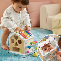 Tiny Land® Cottage Activity Cube with colorful rainbow design, featuring various interactive activities for young children.