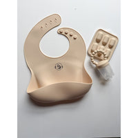 ShopMyLittleSongbird silicone bib showing a colorful, waterproof bib with adjustable neck strap and food-safe silicone material.