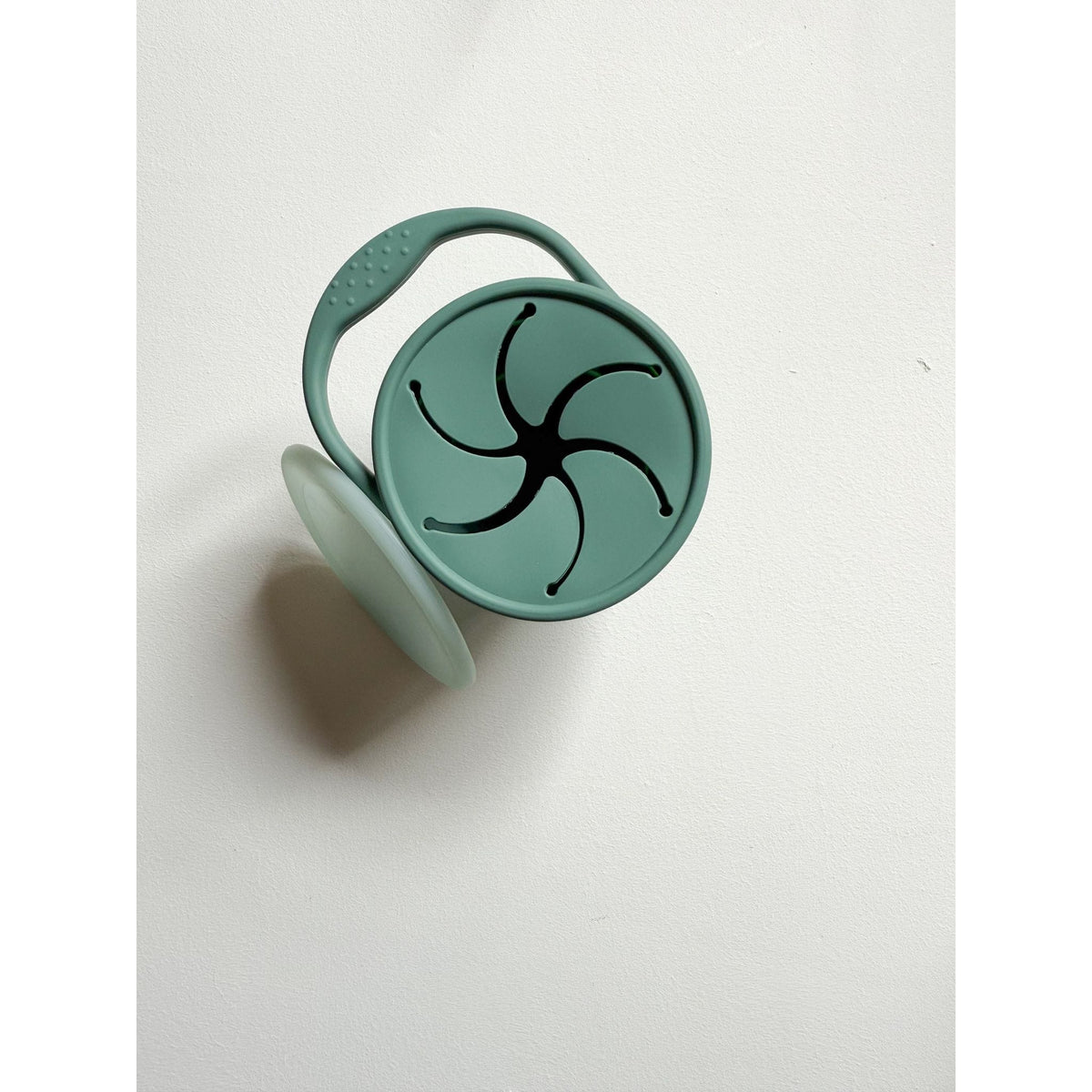 Silicone collapsible snack cup bowl by ShopMyLittleSongbird, flexible and portable for kids' snacks, with a colorful silicone exterior.