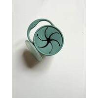 Silicone collapsible snack cup bowl by ShopMyLittleSongbird, flexible and portable for kids' snacks, with a colorful silicone exterior.