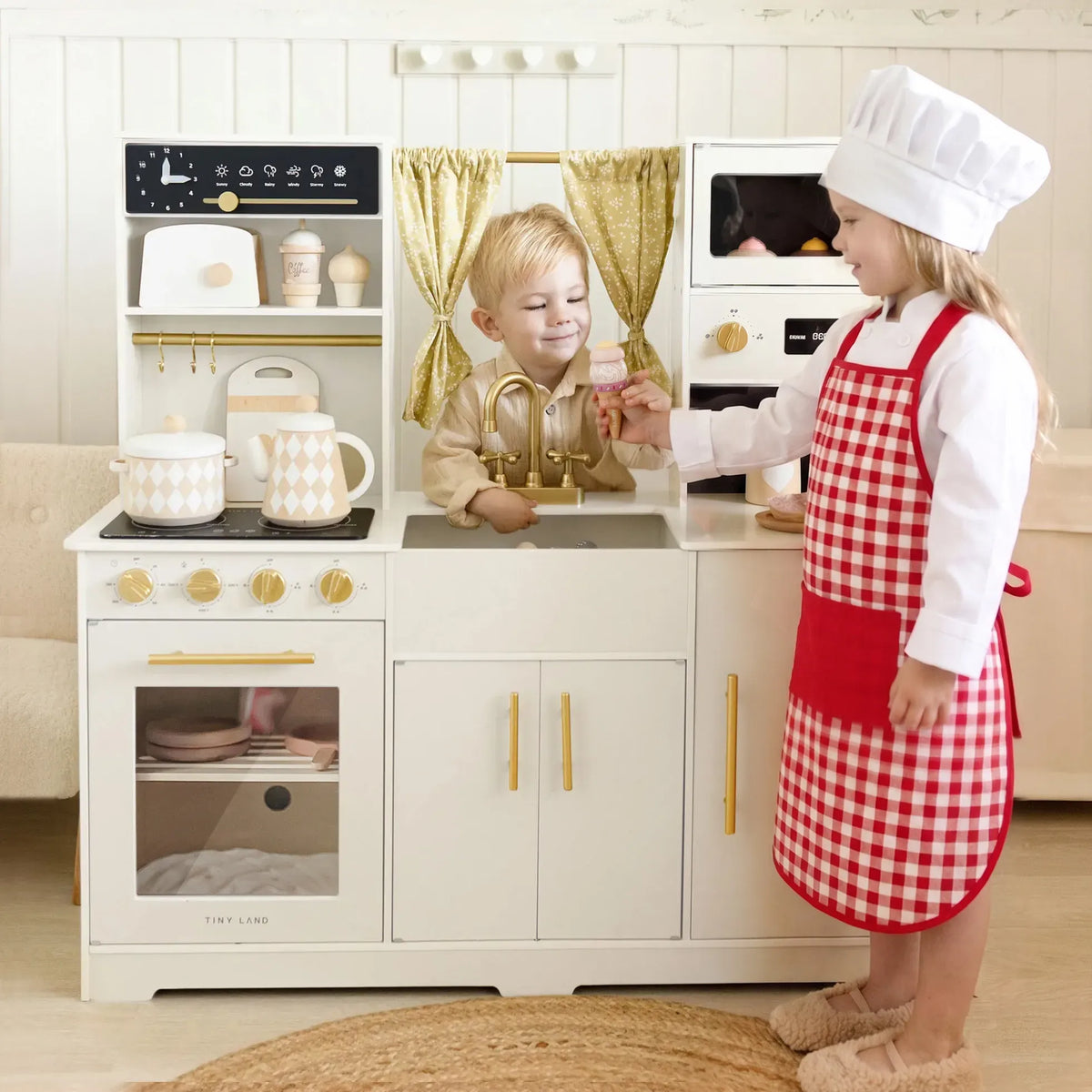 Tiny Land® Iconic Wooden Play Kitchen in cream, featuring pretend stove and oven for kids' imaginative cooking play.