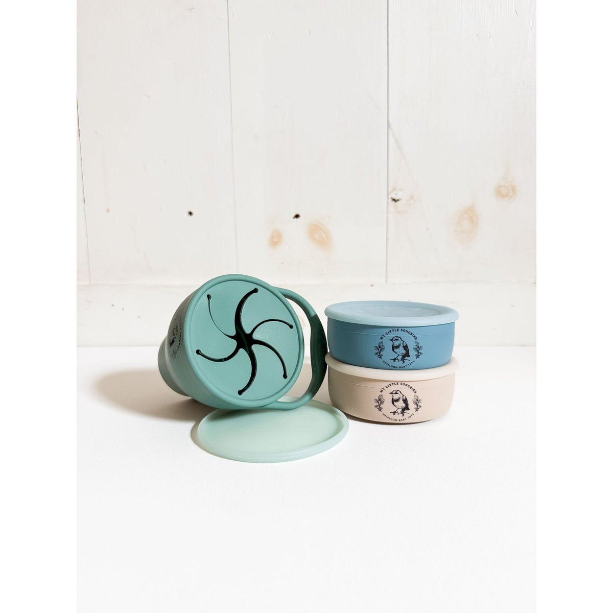 Silicone collapsible snack cup by ShopMyLittleSongbird, flexible bowl with lid for kids' snacks, colorful and portable.