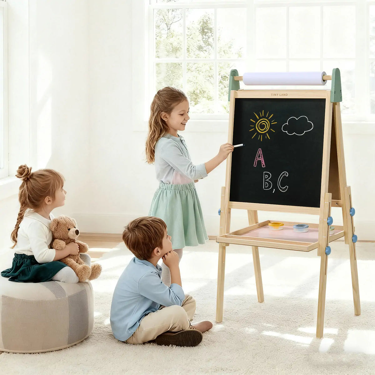 Tiny Land® 3-in-1 kids art easel with chalkboard, whiteboard, and paper holder, ideal for children's creative activities.