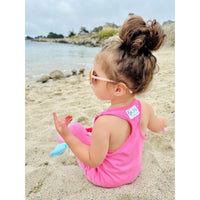 Be Mi Los Angeles romper in bubble gum color, featuring a stylish and comfortable one-piece design for casual wear.