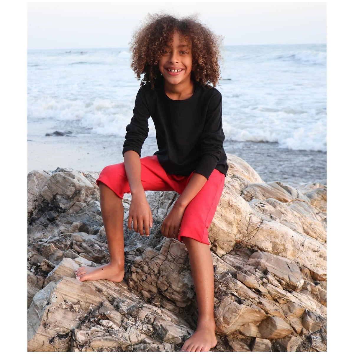 Black Raw Edge Tee Long Sleeve by Be Mi Los Angeles, casual black long sleeve shirt with raw hem details.