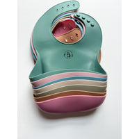 Silicone bib from ShopMyLittleSongbird with adjustable neck strap and food-resistant surface, ideal for feeding toddlers.