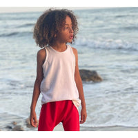 Be Mi Los Angeles Asher Tank in white, sleeveless casual tank top with a relaxed fit and simple design, shown on a hanger.