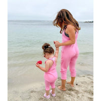 Be Mi Los Angeles romper in bubble gum pink, featuring a stylish, comfortable one-piece design with playful details.