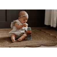 Colorful silicone stacking toy by ShopMyLittleSongbird with multiple cups for stacking and developing fine motor skills.