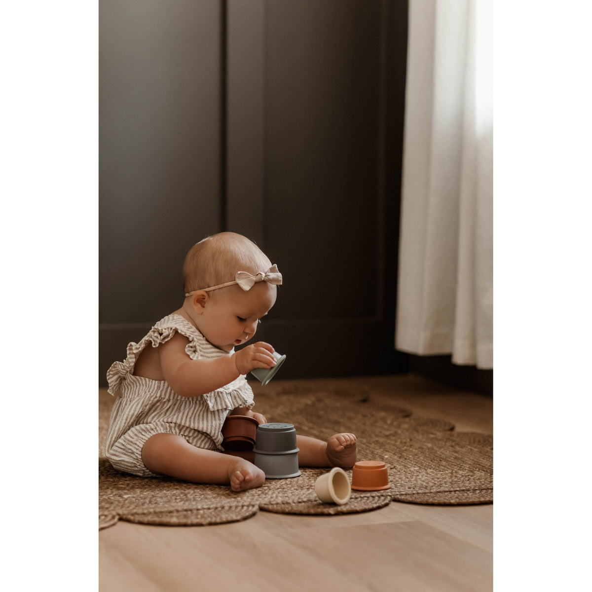 Colorful silicone stacking toy by ShopMyLittleSongbird featuring smooth, flexible cups for kids’ play and developmental fun.