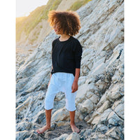 Be Mi Los Angeles Raw Edge Long Sleeve Tee showcasing a casual, stylish black tee with raw edge detailing and long sleeves.