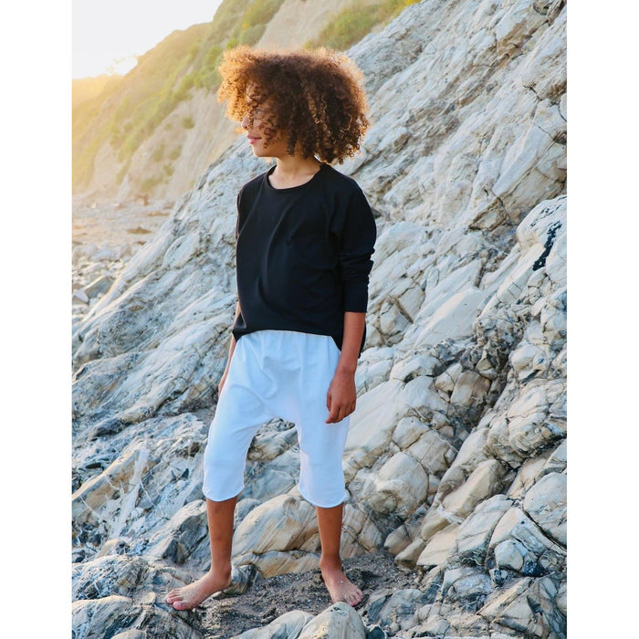 Be Mi Los Angeles Raw Edge Long Sleeve Tee showcasing a casual, stylish black tee with raw edge detailing and long sleeves.