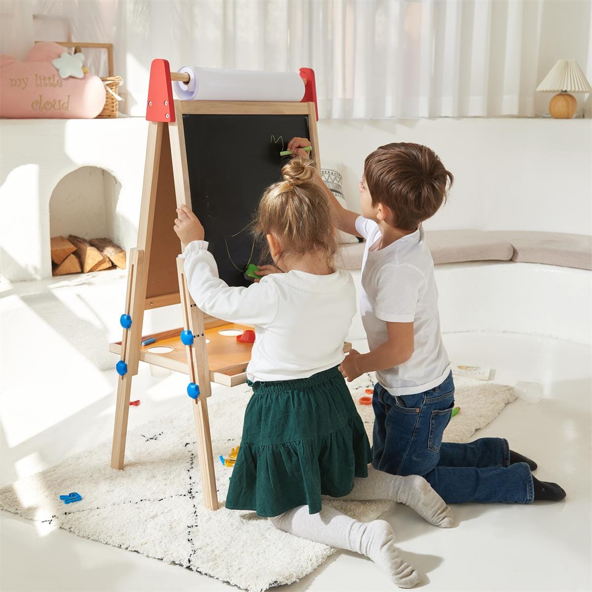 Kids easel from Tiny Land INC with a whiteboard, chalkboard, and paper roll holder for creative art activities.